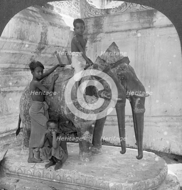 Three headed elephant guarding a sanctuary, Arakan Pagoda, Mandalay, Burma, 1908.  Artist: Stereo Travel Co