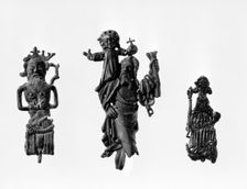 Three medieval pilgrim badges. Creator: Unknown