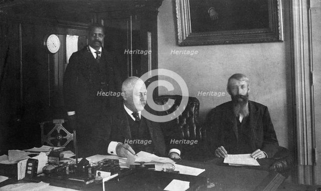 Three men in office in Bureau of Engraving and Printing, Washington, D.C., 1889 or 1890. Creator: Frances Benjamin Johnston.