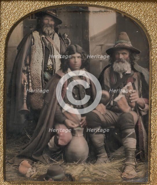 Three Men in Shepherd Attire, One with Bagpipes, the Other Two Holding Bread, 1850s. Creator: Unknown.