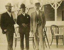 Three men, probably journalists, full-length portrait, facing front, 1905. Creator: Unknown