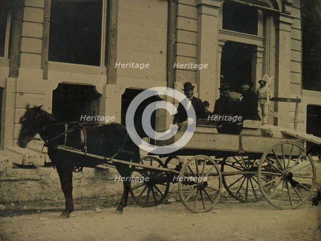 Three Men Seated in a Horse-Drawn Buggy in Front of a Building Under Construction, 1850s-60s. Creator: Unknown.