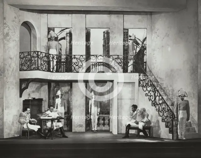 Three men sitting, others on guard, 1938. Creator: Unknown.