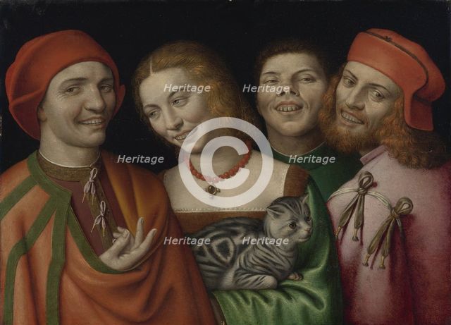 Three men with a woman holding a cat.