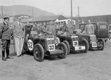 Three MG C type Midgets at the RAC TT Race, Ards Circuit, Belfast, 1932. Artist: Bill Brunell