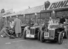 Three MG C type Midgets in the pits at the RAC TT Race, Ards Circuit, Belfast, 1932. Artist: Bill Brunell