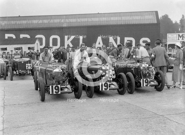 Three MG Magnas at the LCC Relay Grand Prix, Brooklands, Surrey, 1933. Artist: Bill Brunell.