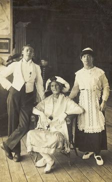 Three soldiers, two in drag, pose in costume, c1920. Creator: Unknown