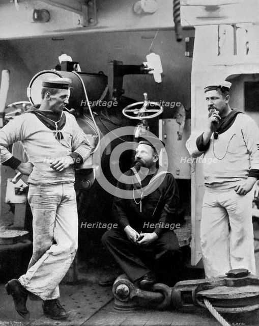 Three petty officers on board the cruiser HMS 'Theseus', 1896. Artist: Gregory & Co