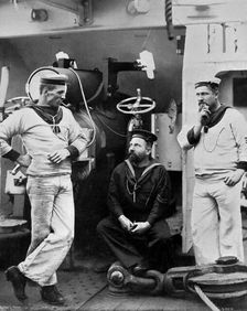 Three petty officers on board the cruiser HMS Theseus 1896. Artist: Gregory & Co