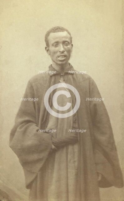 Three quarter portrait of African man, facing front, between 1870 and 1886. Creator: Unknown.