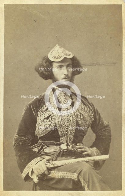 Three-quarter portrait of man, seated, facing right, between 1870 and 1886. Creator: Unknown.