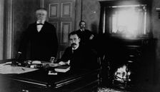 Three Treasury Department employees in office, between 1884 and 1930. Creator: Frances Benjamin Johnston