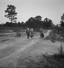 Three turpentine "dippers", Georgia, 1937. Creator: Dorothea Lange