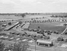 Three units of the camp, each with its sanitary..., Farmersville, Tulare County, CA, 1939. Creator: Dorothea Lange