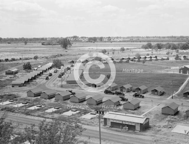 Three units of the camp, each with its sanitary..., Farmersville, Tulare County, CA, 1939. Creator: Dorothea Lange.