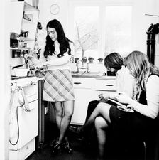 Three young people in the kitchen of a London flat, c1960s. Creator: Henry Grant
