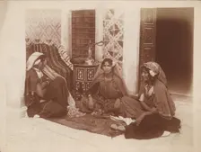 Three young women sitting by a doorway, Tunis, c1910. Ernst Heinrich Landrock, (1878-1966) Creator: Lehnert & Landrock
