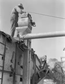 Threshing oats, Clayton, Indiana, 1936. Creator: Dorothea Lange