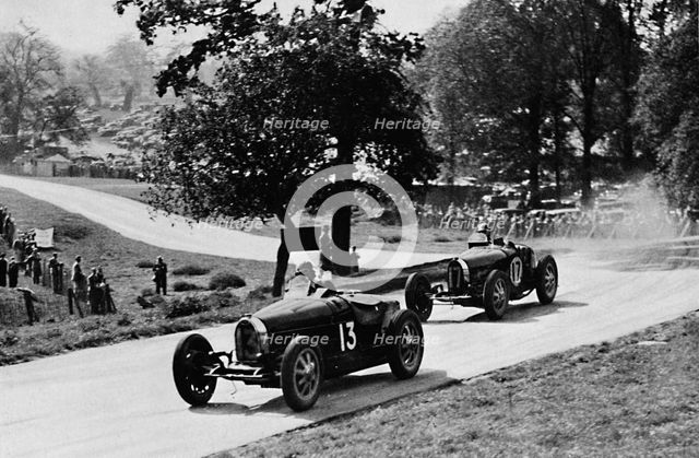 'Thrilling racing in rural England: Bugattis at Donington', 1937. Artist: Unknown.