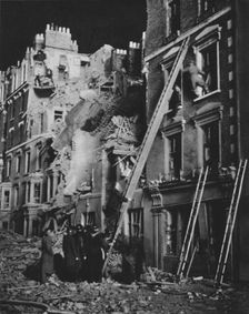 Through the long night the rescue men at work, searching, helping to safety 1941 (1942)