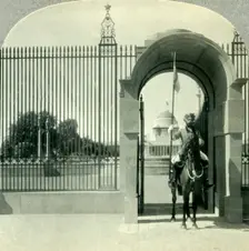 Through a Sentry-guarded Gateway to the Beautiful Government Buildings of New Delhi c1930s. Creator: Unknown