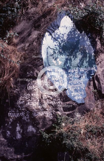 Tibetan script painted on rocks, Dharamsala, India, 1988. Creator: Amanda Waite.