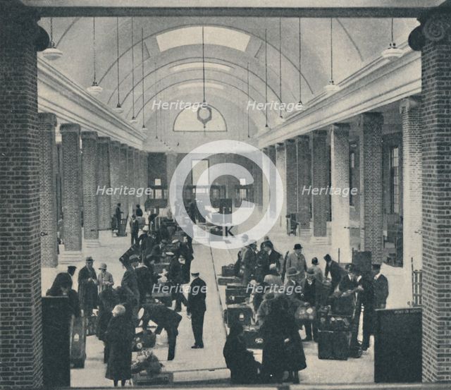 'Tilbury passenger baggage examined in a spacious new building',  1937. Artist: Unknown.