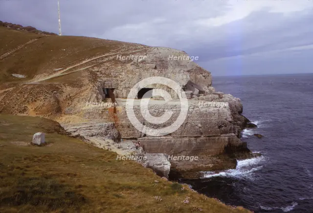 Tilly Whim Caves on Durlston Head, Dorset, 20th century.  Artist: CM Dixon.