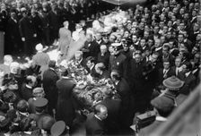 Tim Sullivan's coffin brought out, 1913. Creator: Bain News Service