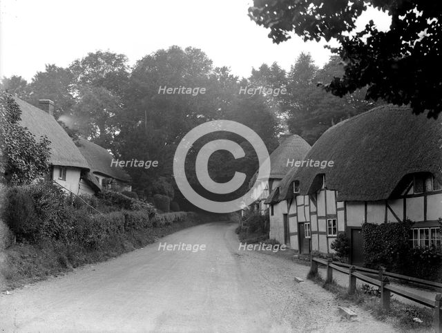 Timber-framed and thatched cottages at Wherwell, Hampshire, 1927. Artist: Nathaniel Lloyd