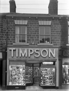 Timpson's shoe shop window, Mexborough, South Yorkshire, 1956. Creator: Michael Walters