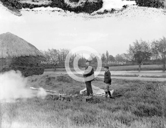 Tims the Timekeeper and starter, starting off a race during Eights Week, Oxford, c1860-c1922. Artist: Henry Taunt