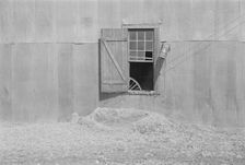 Tin wall of the cotton gin building, Vicinity of Moundville, Alabama, 1936. Creator: Walker Evans
