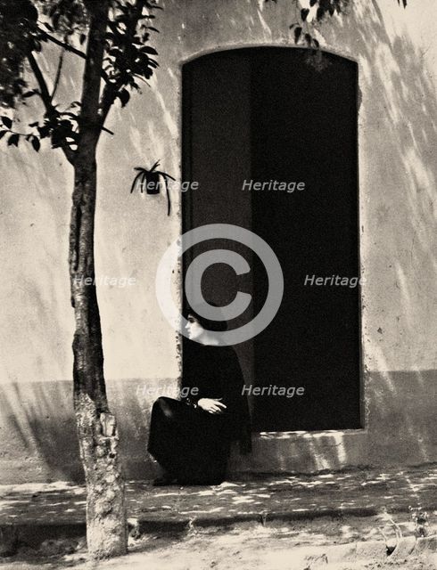 Tina at the door, 1923. Creator: Tina Modotti.