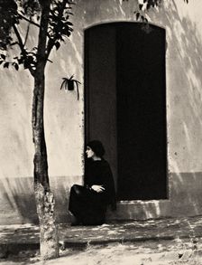 Tina at the door, 1923. Creator: Tina Modotti