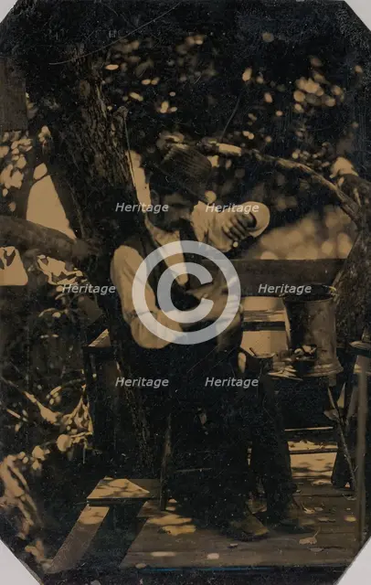 Tinsmith Working Under a Tree, 1870s. Creator: Unknown.