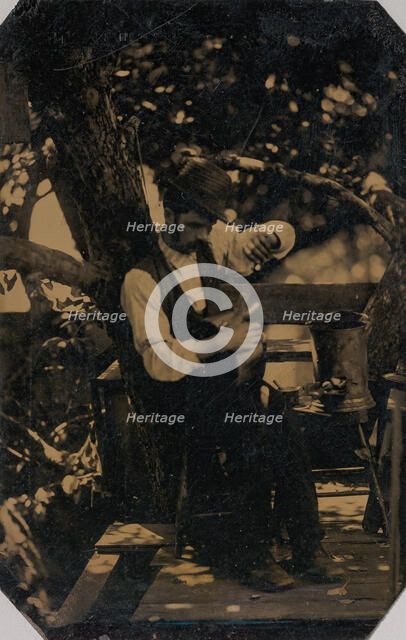 Tinsmith Working Under a Tree, 1870s. Creator: Unknown.