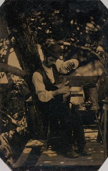 Tinsmith Working Under a Tree, 1870s. Creator: Unknown