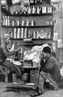 Tinsmiths in a tinsmith's shop, India, 1922.Artist: R Gorbold