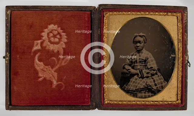 Tintype of a girl in a plaid dress, 1870s. Creator: Unknown.