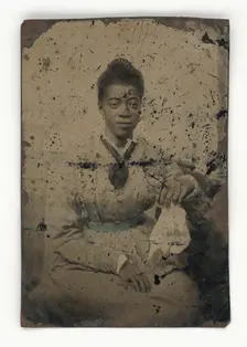 Tintype of a woman, 1856-1900. Creator: Unknown