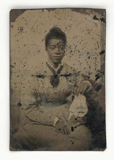 Tintype of a woman, 1856-1900. Creator: Unknown