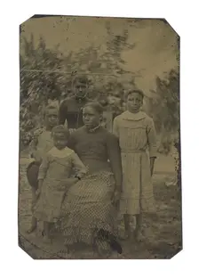 Tintype of a woman and four children, 1870s. Creator: Unknown
