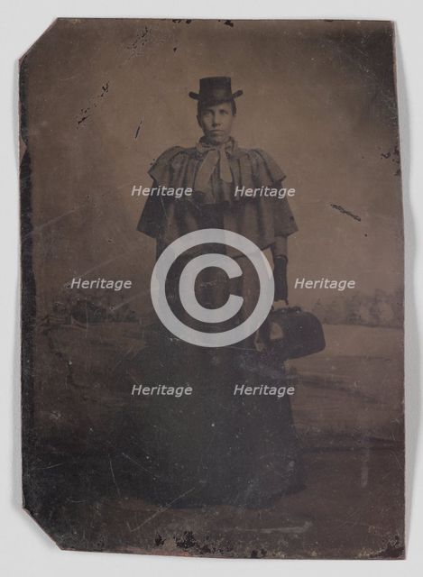 Tintype of a woman carrying a medical bag,1890s. Creator: Unknown.