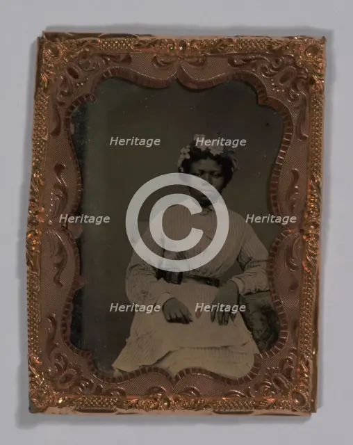 Tintype of a woman wearing a striped dress with flowers in her hair, 1855-1860s. Creator: Unknown.