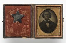 Tintype of Creed Miller with star-shaped military identification pin, 1864. Creator: Unknown