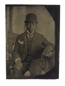 Tintype of man in suit, tie, and hat, after 1860s. Creator: Unknown
