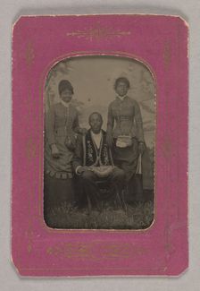 Tintype photograph of a man identified as James Turner, with two women, ca. 1873. Creator: H.G. Pearce