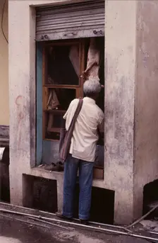 Tiny butcher's shop, McLeod Ganj, Dharamsala, India, 1988. Creator: Amanda Waite
